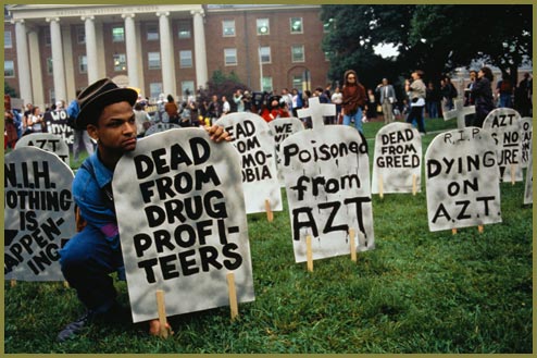 ACT UP members place gravestone placards on front lawn of NIH building