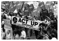 ACT UP members gather with signs and banners for protest