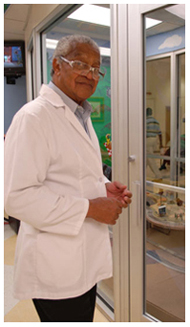 Dr. Aaron Shirley stands outside entrance to Jackson Medical Mall children's clinic