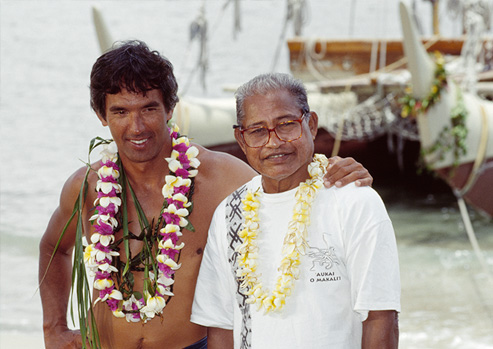 Nainoa Thompson of the Polynesian Voyaging Society stands next to Micronesian wayfinder, Mau Piailug.