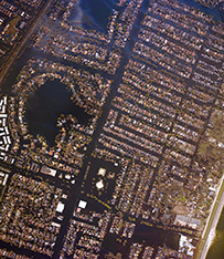 Aerial view of a flooded city.