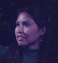 Dr. Mary Hasbah Roessel, an American Indian female smiling for her portrait.