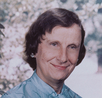 Dr. Anneliese Lotte Sitarz, a White female posing outdoors for her portrait.