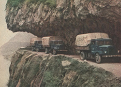 Advertisement showing three trucks driving around the edge of a mountain, below is a can of medicine and text